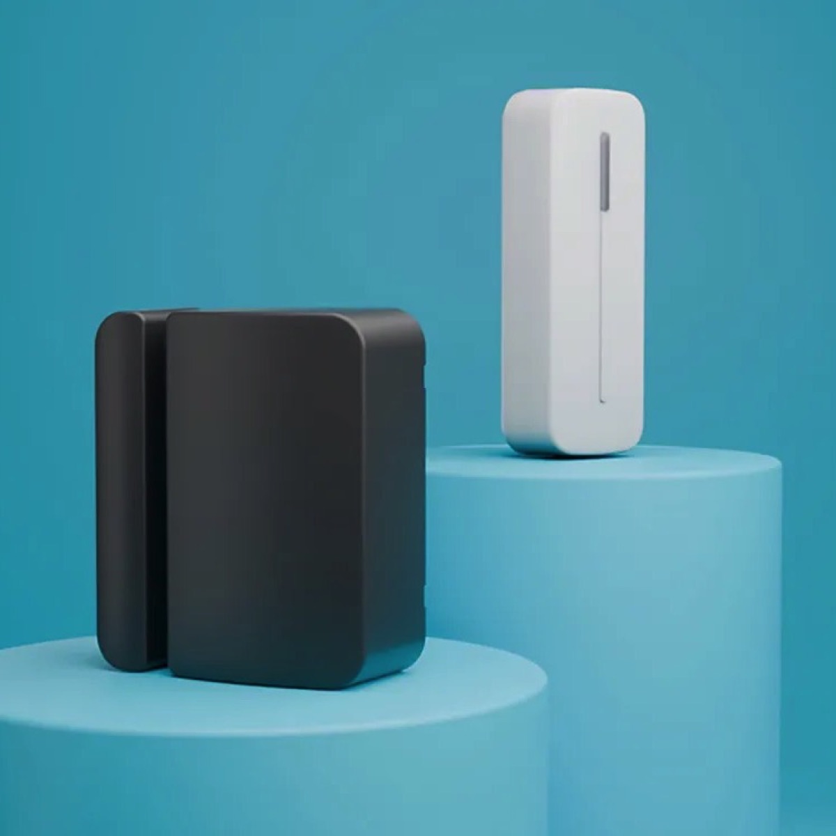 Black contact sensor and white tilt sensor from Abode