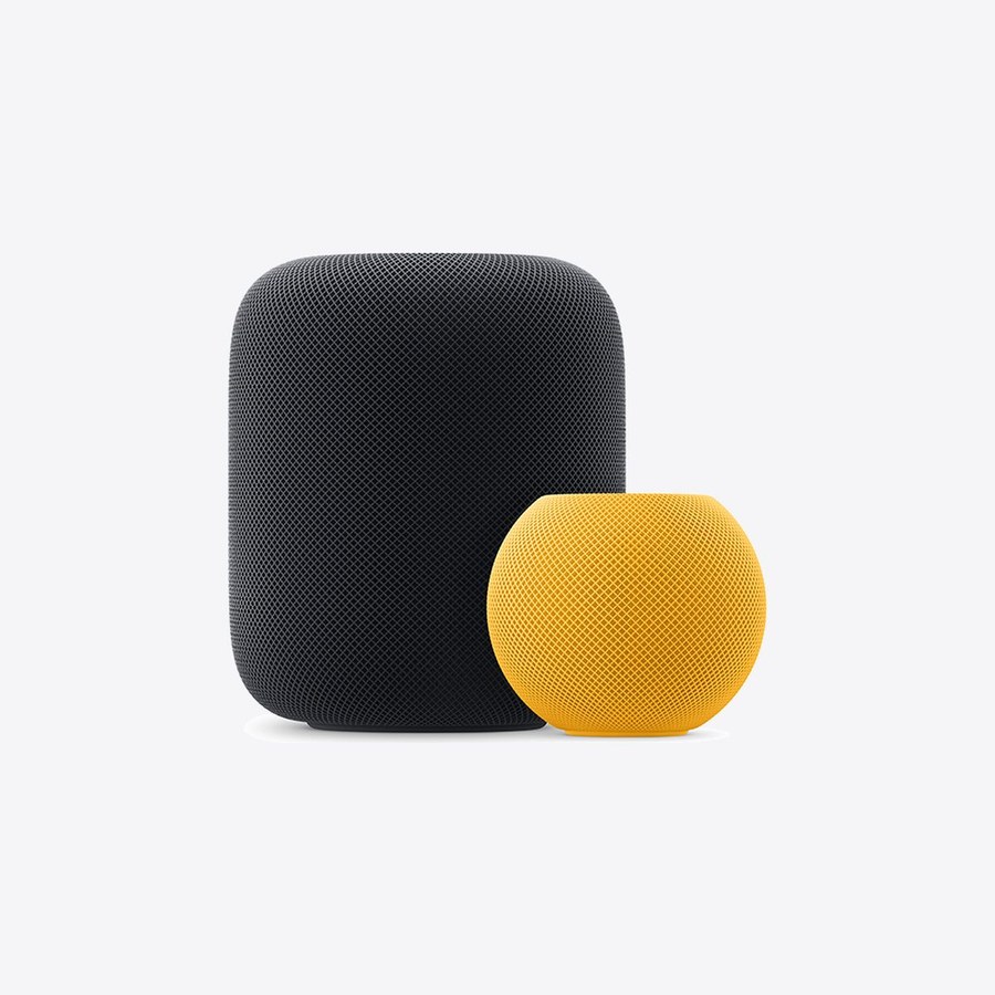 HomePod in Mitternacht neben einem gelben HomePod mini