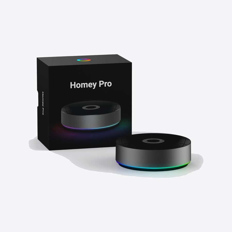 Homey Pro next to its black box